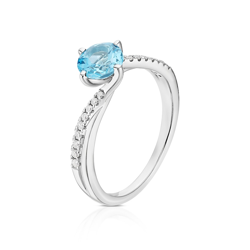 Main Image 2 of 9ct White Gold 0.10ct Diamond & Blue Topaz Solitaire Ring