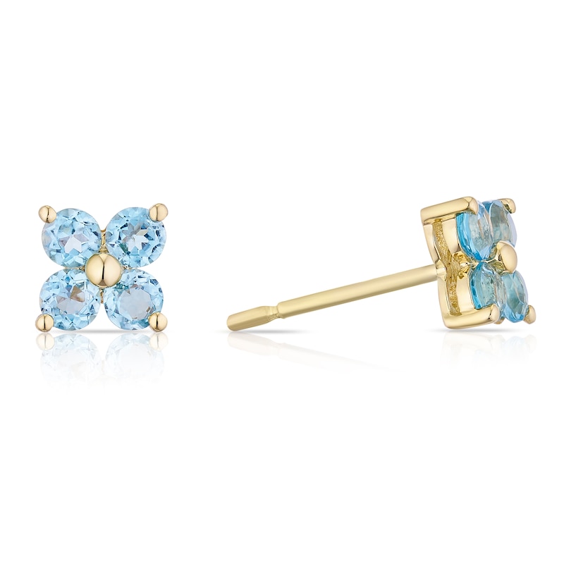 Main Image 1 of 9ct Yellow Gold Blue Topaz Dainty Flower Shaped Stud Earrings